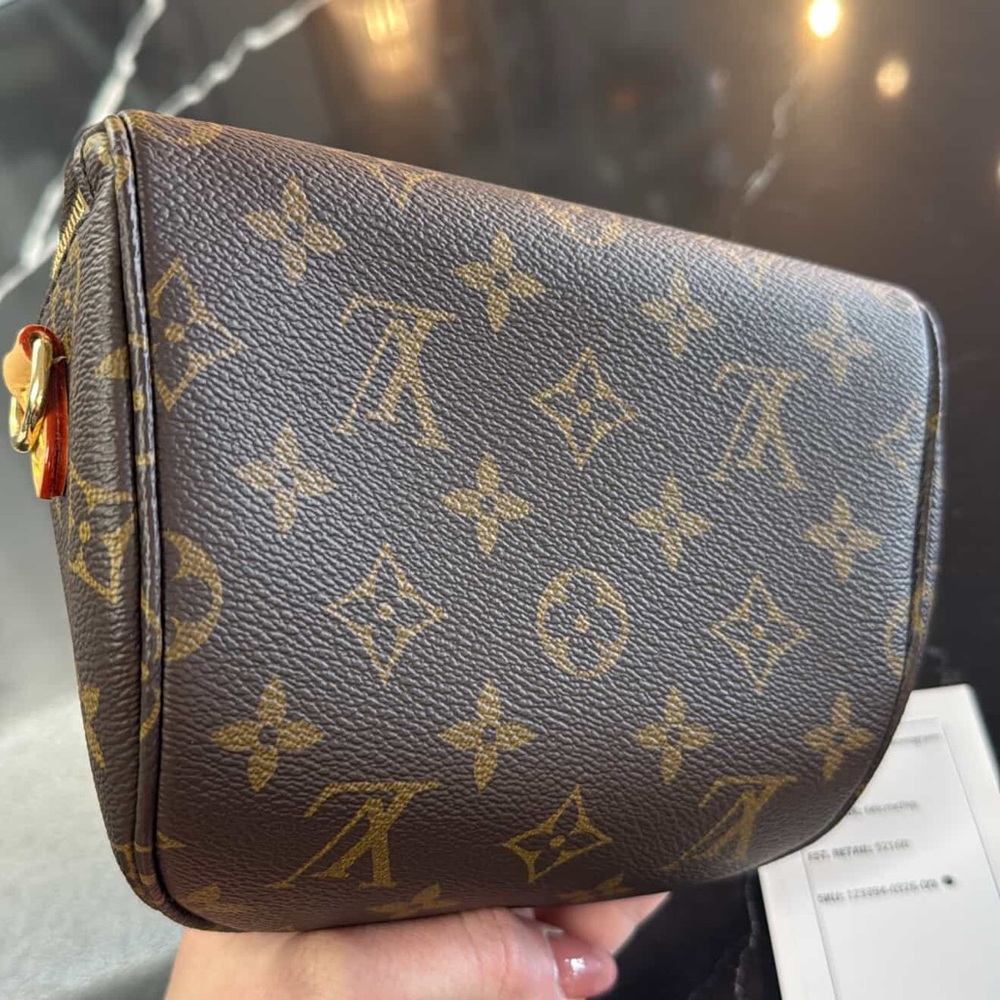 Louis Vuitton Mini Bumbag in Monogram Canvas Retails: $2160 - Picture 3 of 11